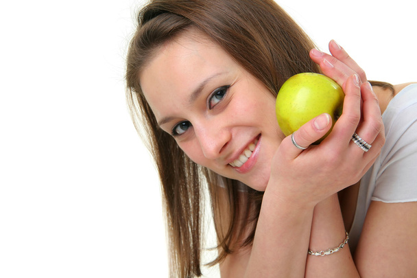 The beautiful girl with apple - Foto, afbeelding