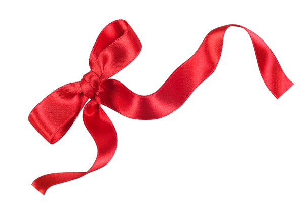Закрыть бант красной ленты для подарка на белом фоне
. - Фото, изображение