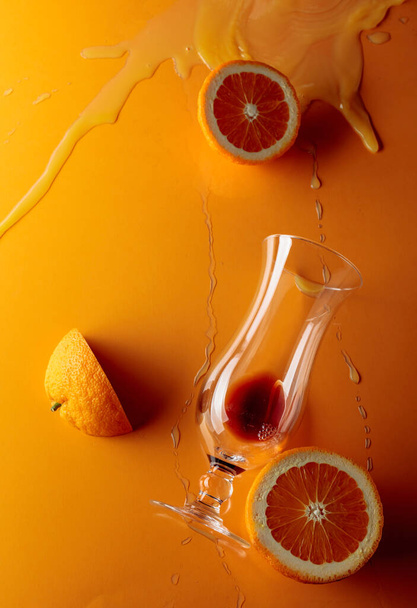 Cocktail "Tequila sunrise" on a orange background. Top view. - Fotografie, Obrázek