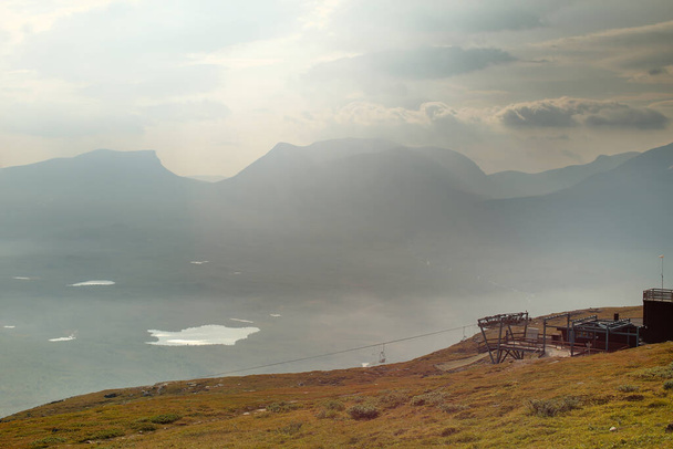 View on misty valley Lapporten from Mount Nuolja. - Photo, Image