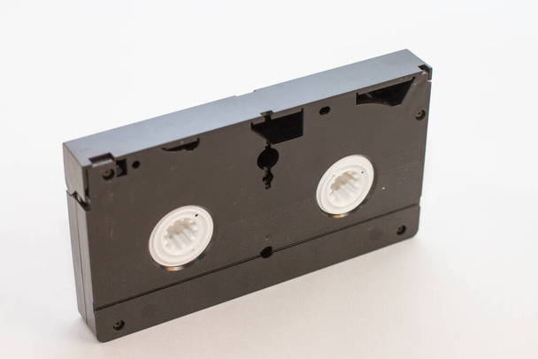 une cassette vidéo VHS sur fond blanc
 - Photo, image