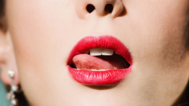 tip of tongue licks lips - Foto, Imagem
