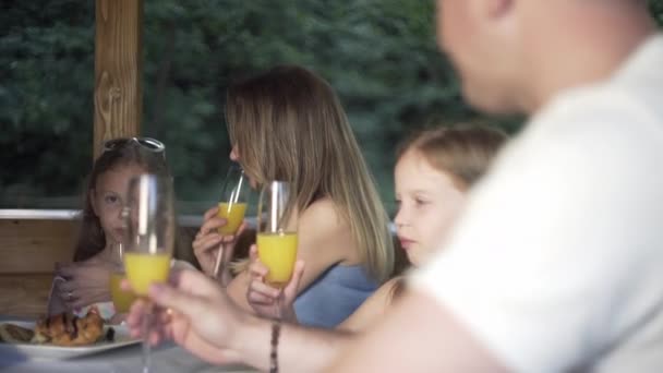  Family having dinner in summer evening. - Footage, Video