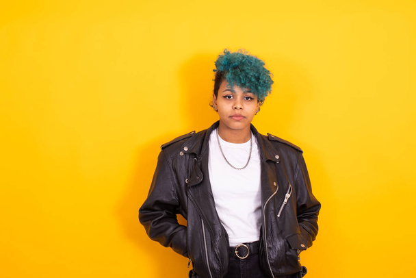 young urban hipster girl isolated on yellow background - Valokuva, kuva