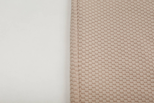 texture of light brown fabric close up - Foto, afbeelding