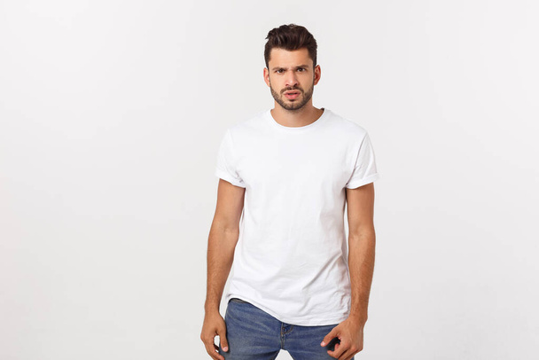 Charming handsome. Handsome young man in casual wear while standing isolated on white background - Fotografie, Obrázek