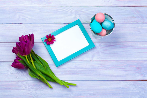 Easter background with tulips, eggs. Creative photo. - Zdjęcie, obraz