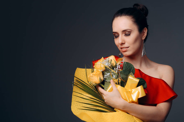 Beautiful Elegant Woman Receiving Flower Bouquet  - Foto, afbeelding
