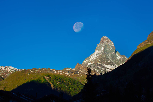 The peak of Matterhorn in Switzerland from the village of Zermatt. - Photo, Image