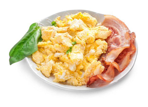 Plate with scrambled egg and bacon on white background - Photo, Image