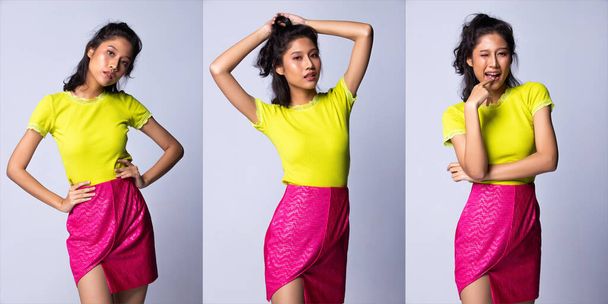 Jong Aziatisch vrouw als mode Model slijtage Groen shirt en neon roze korte rok met siliconen roze handtas tas koppeling, Studio verlichting grijze achtergronden geïsoleerd, collage groep pack portret - Foto, afbeelding