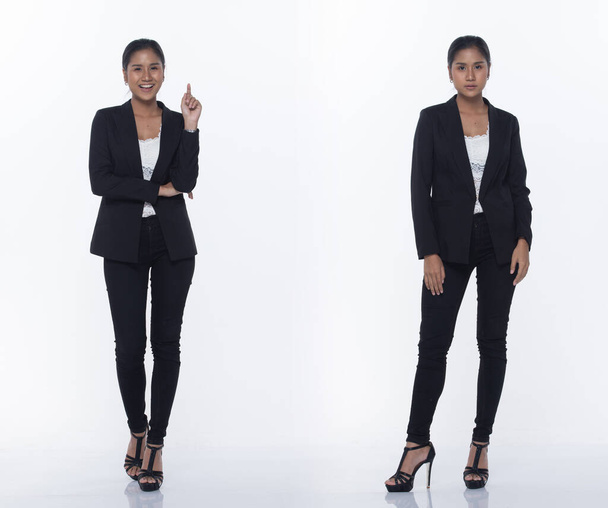 Full Length Snap Figure, Asian Business Woman Stand in black Formal proper Suit pants and shoes, studio lighting white background isolated, Lawyer Boss act posing smile smart look - Fotó, kép