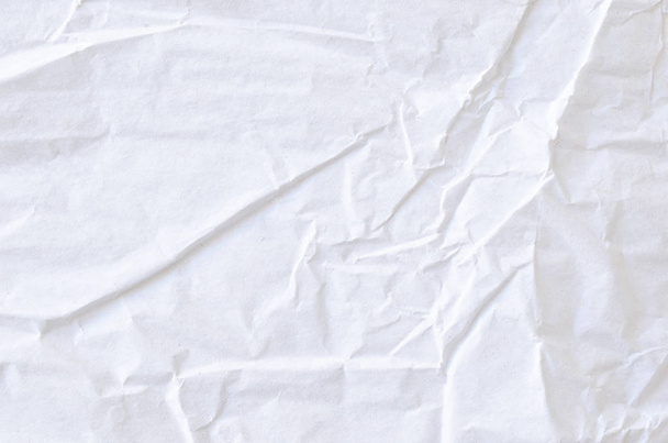 Kreativní pozadí s rozptýleným překrytím zmačkaného bílého papíru. - Fotografie, Obrázek