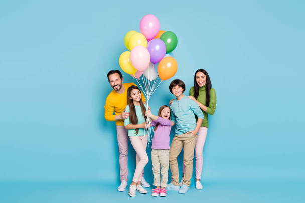 Full length body size view of nice attractive lovely charming cheerful cheery big full family celebrating occasion festal decoration isolated on bright vivid shine vibrant blue color background - Фото, зображення