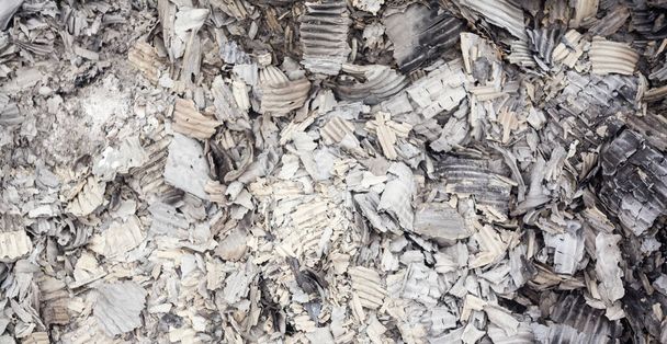 Pile of burnt corrugated paper. Close up. - Фото, зображення