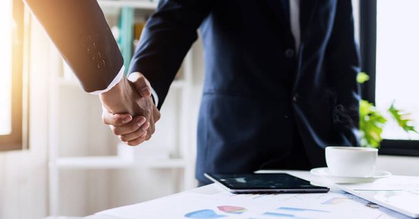 successful negotiate and handshake concept, two businessman shake hand with partner to celebration partnership and teamwork, business deal - Photo, Image