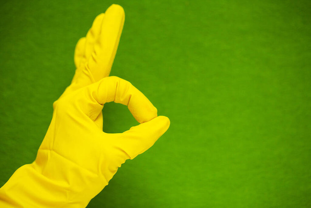 Product for professional cleaning on green background - Foto, imagen