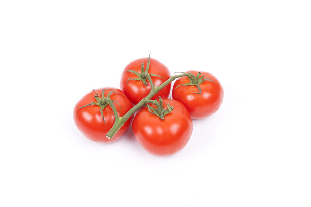 ντομάτες σε μια άμπελο σε λευκό φόντο - Φωτογραφία, εικόνα