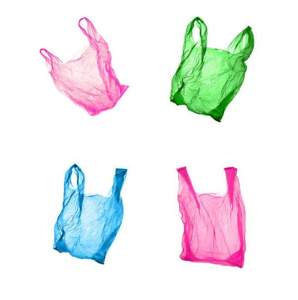 Plastic bags of different colors on a white background. Isolated images. - Фото, зображення