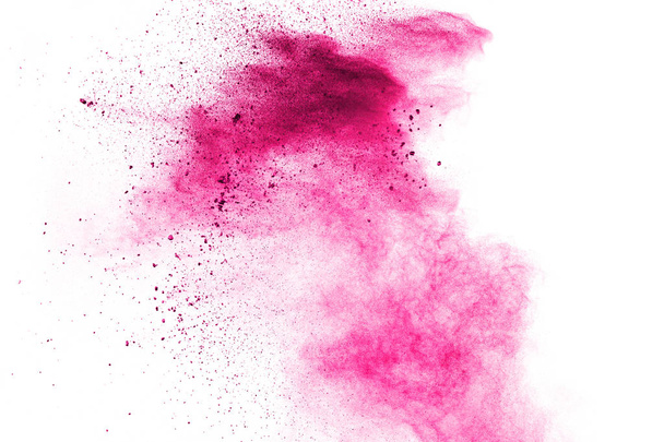Streszczenie głębokiej eksplozji różowego proszku na białym tle. Zamrożenie ruchu głęboko różowy proszek splash. - Zdjęcie, obraz