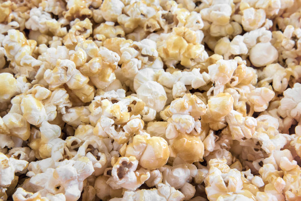 detail of caramel popcorn, texture of sweet food - Photo, Image