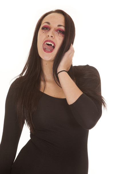 вампір показує язик ікла
 - Фото, зображення