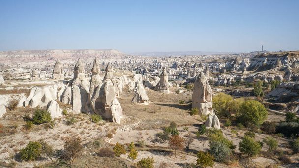 Landscape with a weird sandstone rocks in Cappadocia, Turkey. - Fotografie, Obrázek