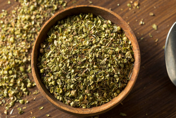 Raw Dried Green Greek Oregano Spice in a Bowl - Zdjęcie, obraz