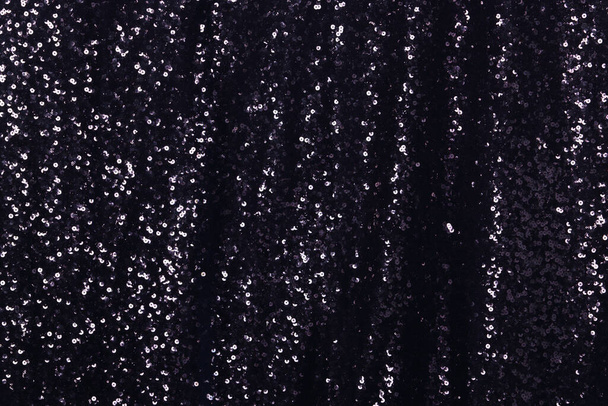 Zwarte pailletten patroon textuur mode achtergrond, textiel grote stof vel - Foto, afbeelding
