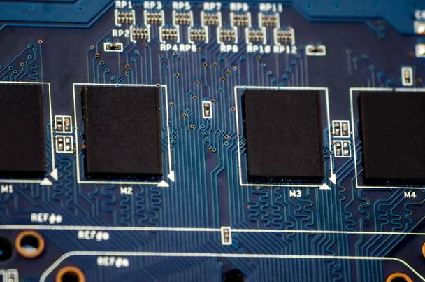 printed blue computer motherboard - Φωτογραφία, εικόνα