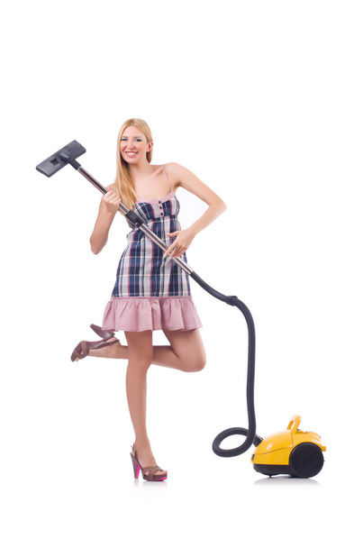 Young woman with vacuum cleaner on white - Фото, изображение
