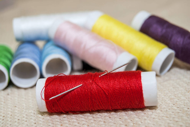 set of multi-colored rainbow threads for sewing with needle - Valokuva, kuva