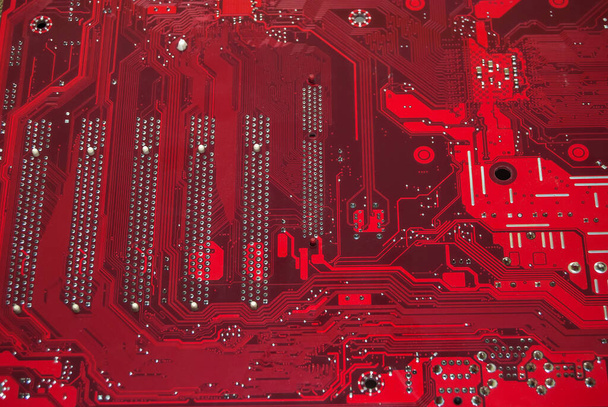 circuit board of red motherboard back side - Fotoğraf, Görsel