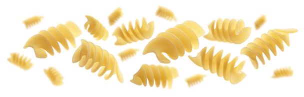 Italian pasta levitating on a white background - Foto, afbeelding