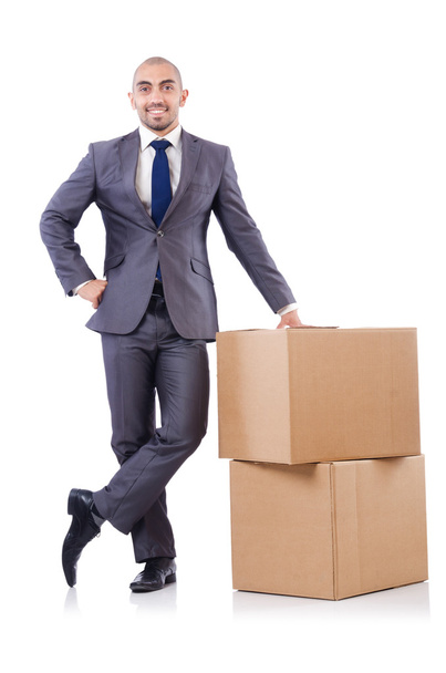Businessman with box isolated on the white - Foto, Imagen