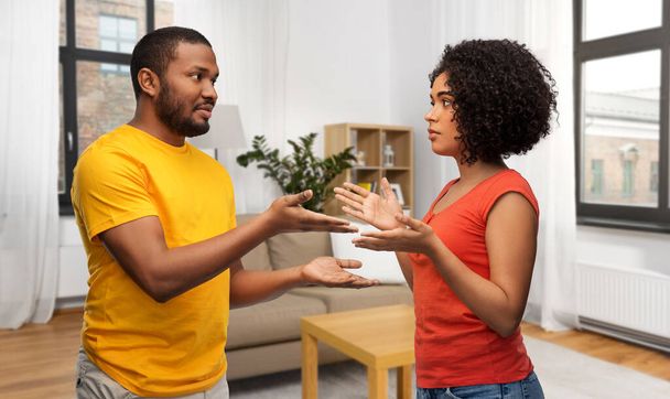 african american couple having argument at home - Foto, immagini
