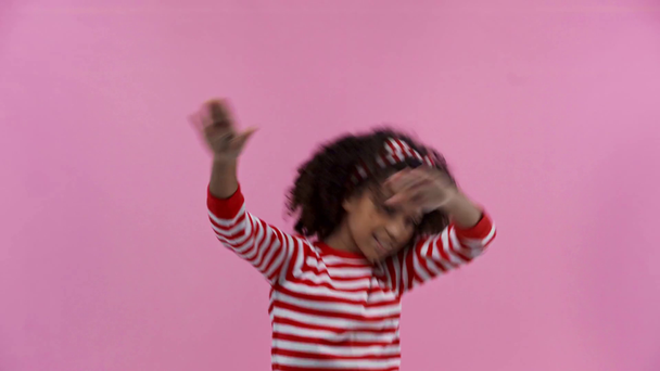 happy african american kid dancing isolated on pink  - Felvétel, videó