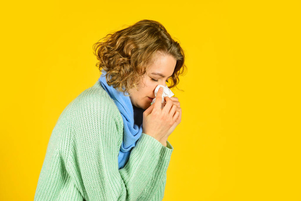 sneezing in napkin. Symptoms of disease. runny nose caused by illness. ill with laryngitis. Acute respiratory viral. sick woman runny nose. influenza infection and pneumonia. Coronavirus outbreak - Foto, immagini
