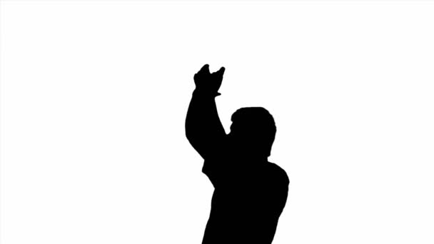Silhouette eines in die Hand klatschenden Mannes. applaudierende Person auf weißem Hintergrund. - Filmmaterial, Video