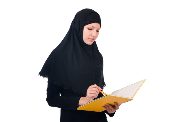 Young muslim female student with books - 写真・画像