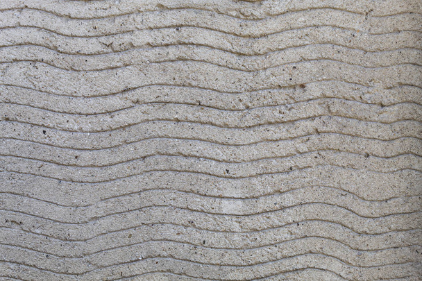 Grayish Concrete Wall With Hand Made Wavy Texture - Foto, afbeelding