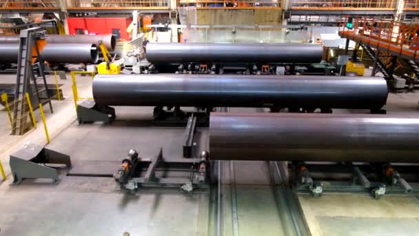 Pipe factory production line, pipes moving on roller conveyor - Footage, Video