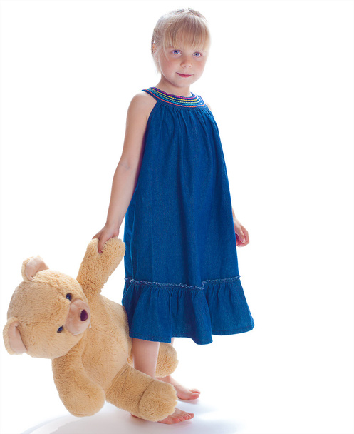 Girl with teddy-bear. - Zdjęcie, obraz