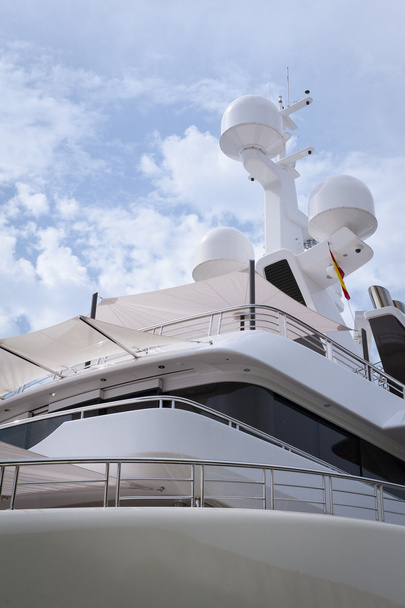 Low angle view over the stern of the navigation equipment on a large luxury yacht - Фото, изображение