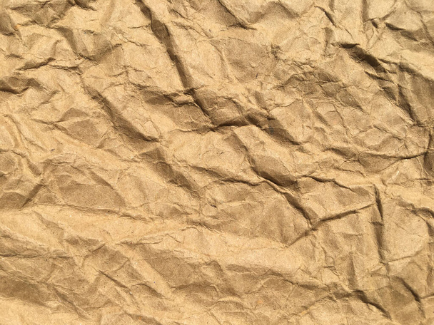 Brown wrinkle recycle paper background for Design. Blank  surface for text or work - Photo, Image