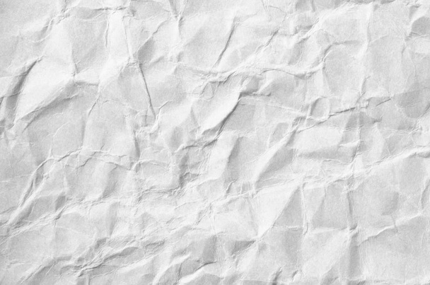 Fondo creativo con superposición dispersa de papel blanco arrugado
. - Foto, imagen