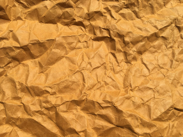 Old brown crumpled paper background with copy space for Design. Closeup view - Photo, Image