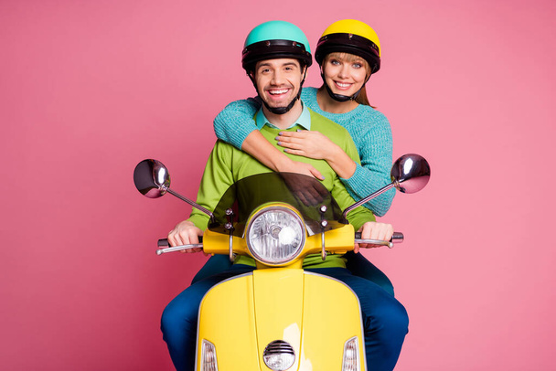 Photo of funny lady guy in love sit drive vintage yellow moped hugging visit foreign countries enjoy vacation together wear casual outfit headgear isolated pink color background - Фото, зображення