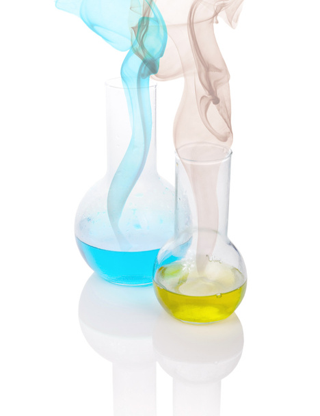 blue and yellow chemical liquid with smoke - Фото, зображення