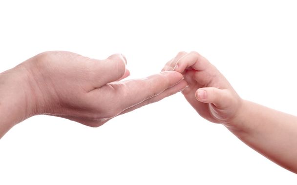 daughter touching mother hand - Photo, Image